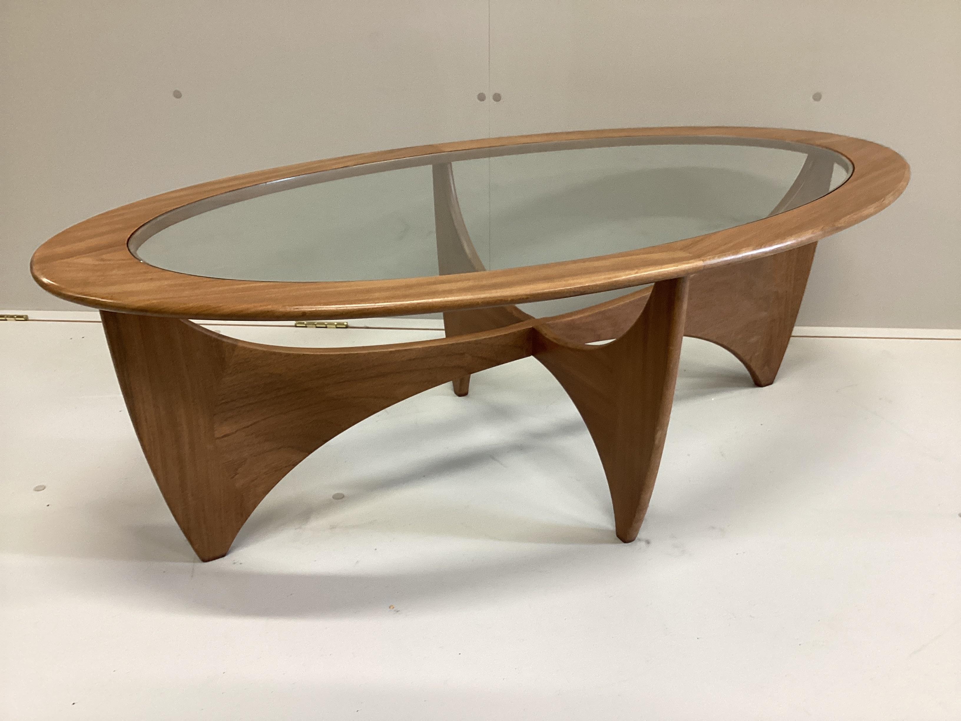 A mid century G Plan Astro teak oval coffee table, width 122cm, depth 66cm, height 42cm